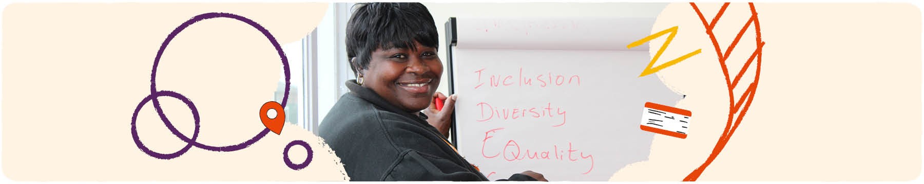 Black woman smiling in diversity and inclusion meeting.