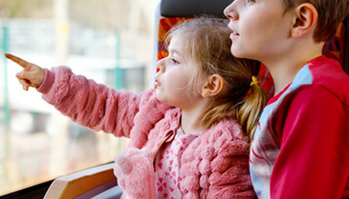 Children looking out of a train window