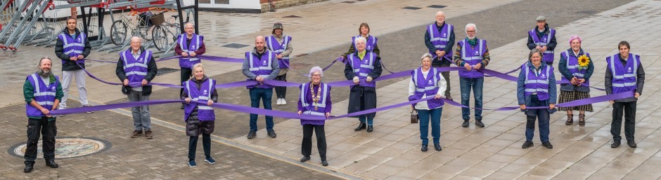 West Midlands Railway station volunteers add a splash of colour for World Polio Day